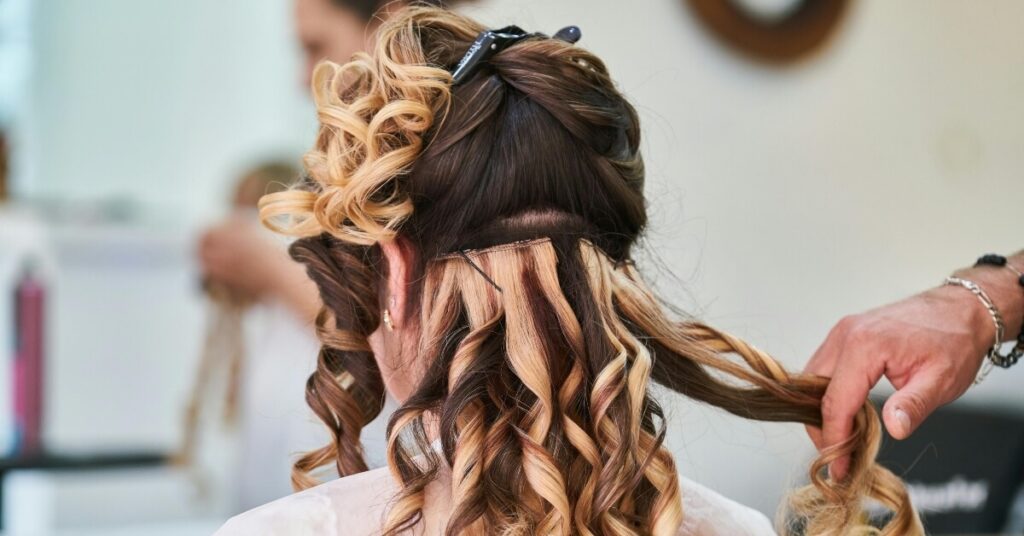 back of woman's head with hair extensions