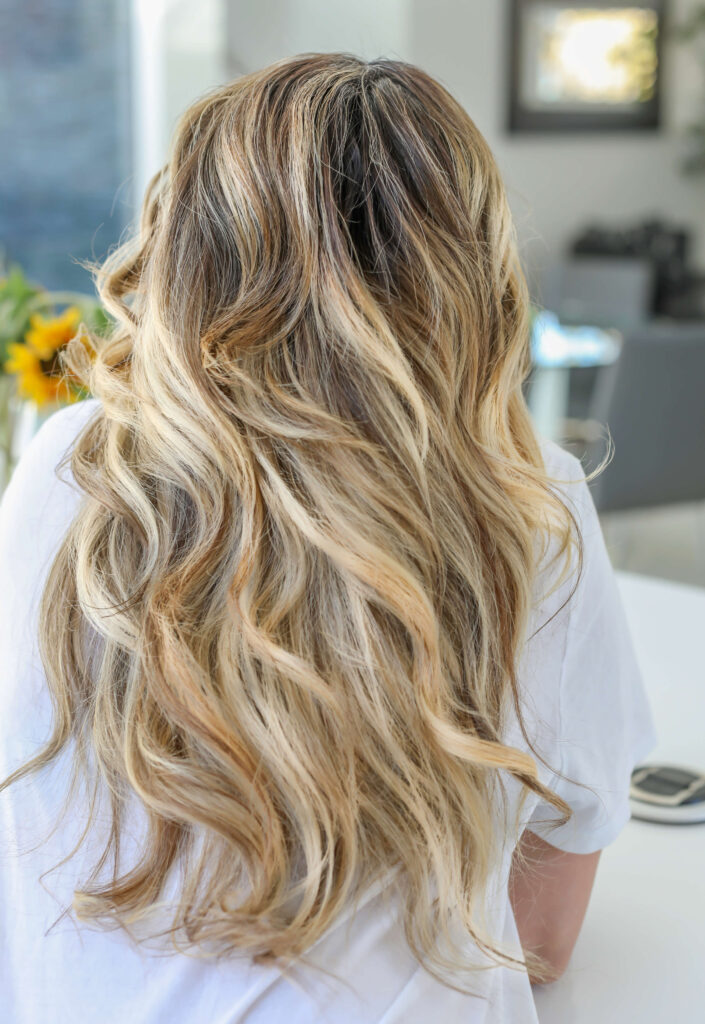 blonde-balayage-pic-from-salon-chair long wavy blonde hair